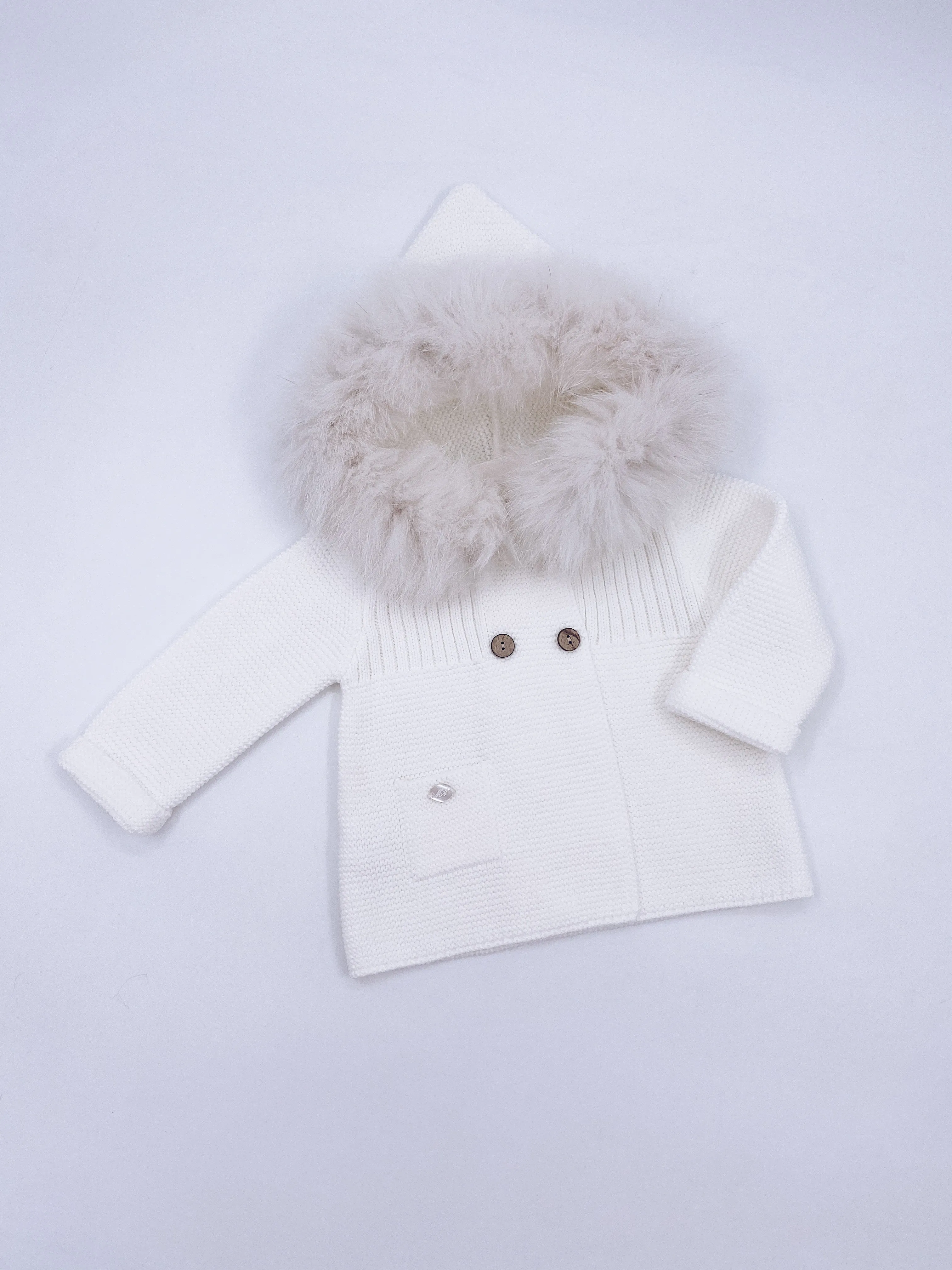 Beautiful Ivory knitted Cardigan with Luxurious fur trim.