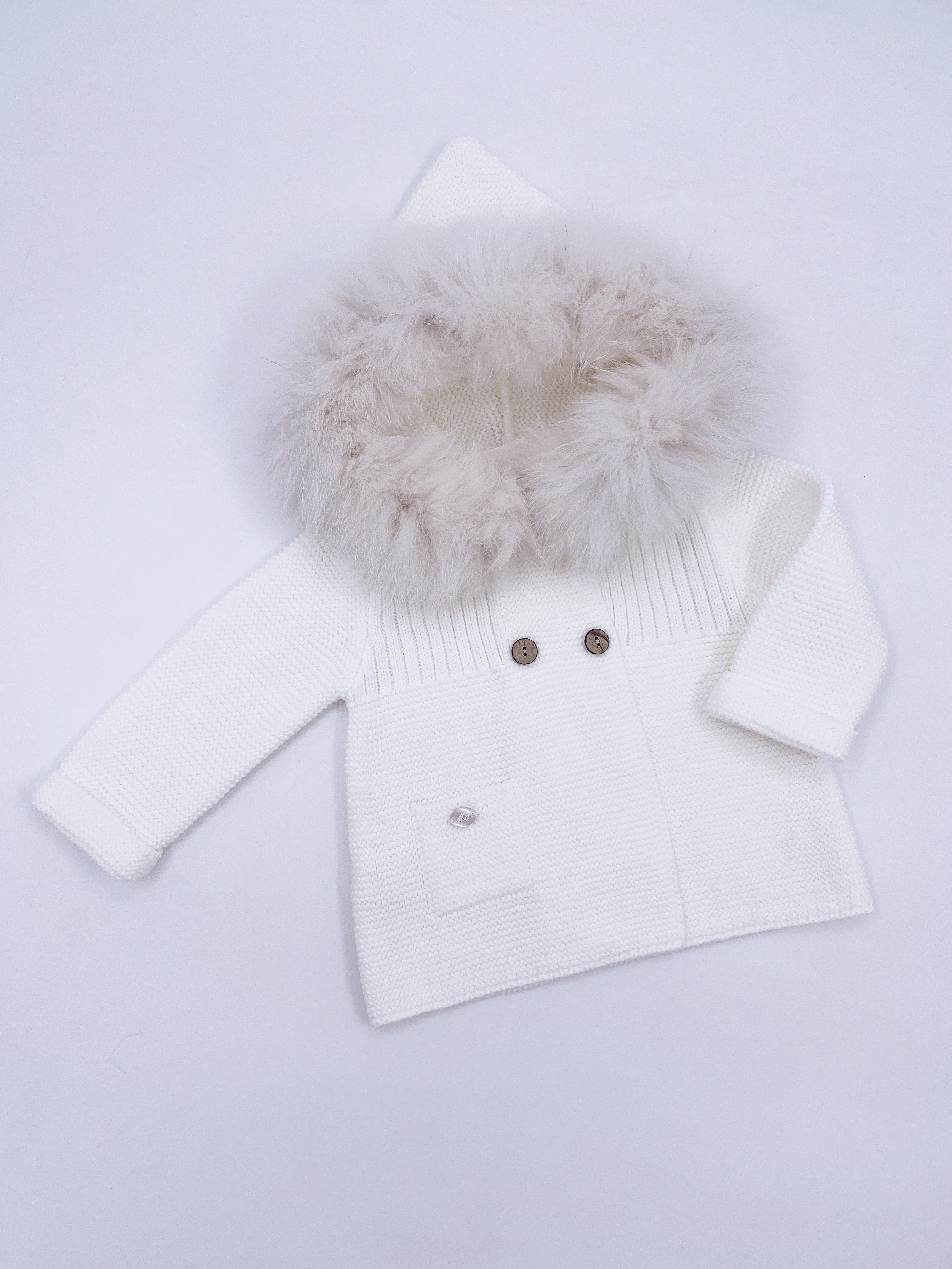 Beautiful Ivory knitted Cardigan with Luxurious fur trim.