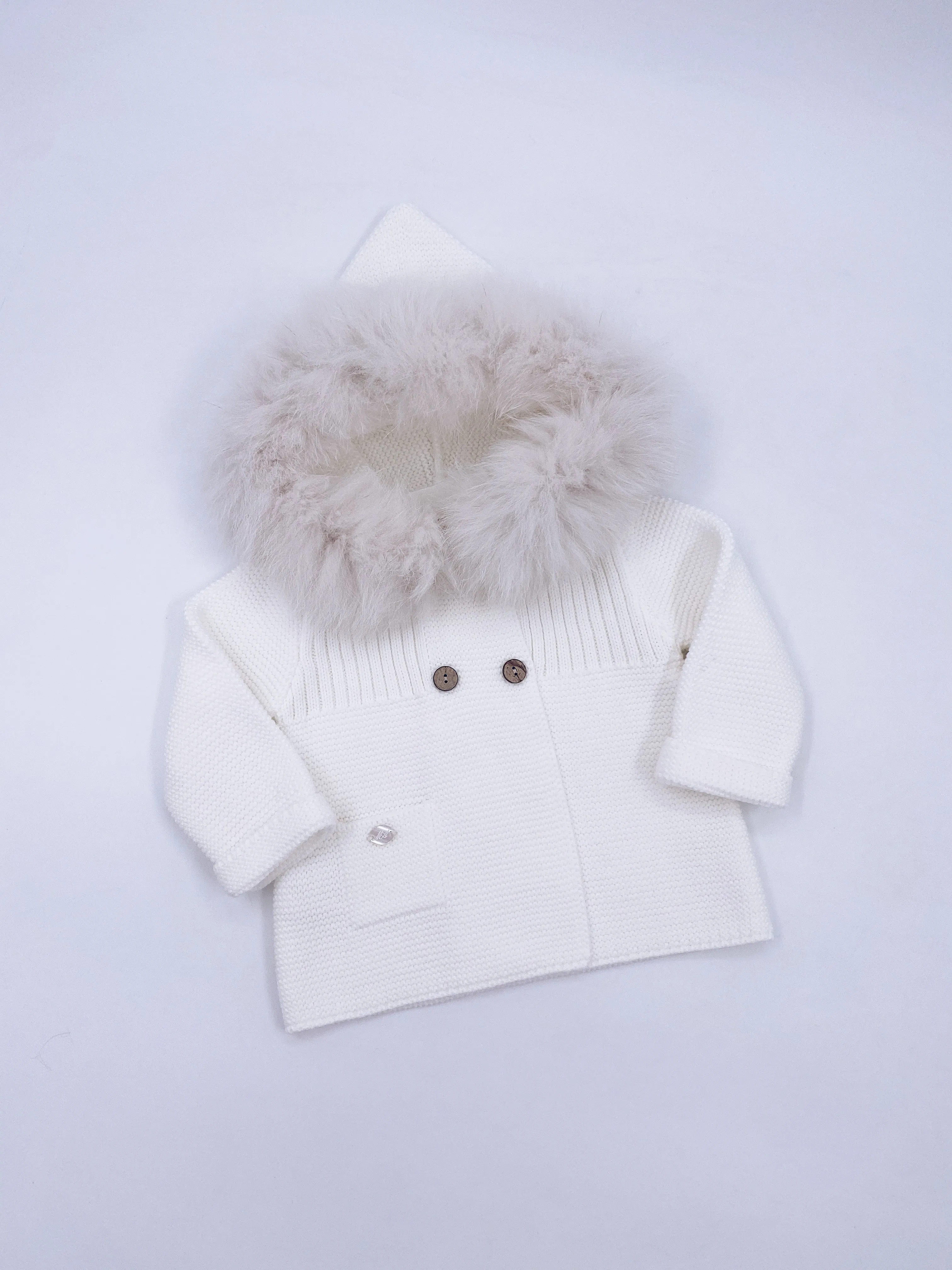 Beautiful Ivory knitted Cardigan with Luxurious fur trim.