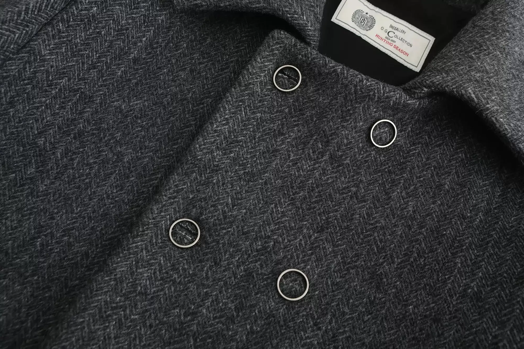 Classic Gray Herringbone Double-Breasted Structured Wool Coat with Unique Lapel